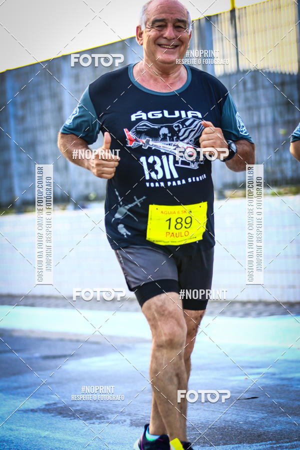 Buy your photos of the eventguia 13K Praia Grande on Fotop
