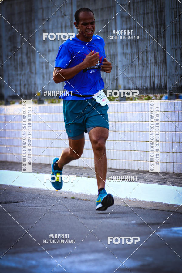 Buy your photos of the eventguia 13K Praia Grande on Fotop