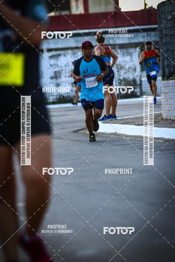 Buy your photos of the eventguia 13K Praia Grande on Fotop