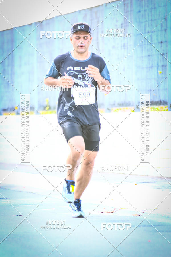 Buy your photos of the eventguia 13K Praia Grande on Fotop