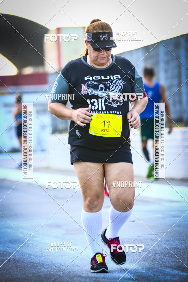 Buy your photos of the eventguia 13K Praia Grande on Fotop