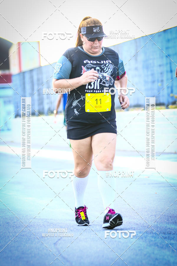 Buy your photos of the eventguia 13K Praia Grande on Fotop