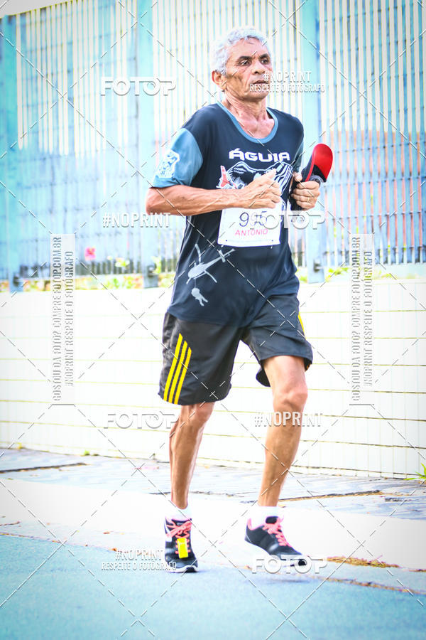 Buy your photos of the eventguia 13K Praia Grande on Fotop