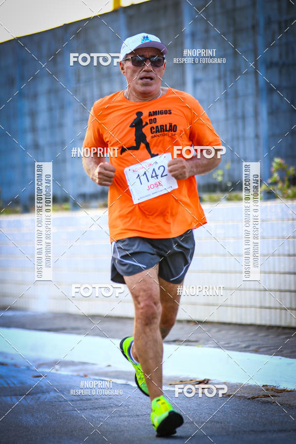 Buy your photos of the eventguia 13K Praia Grande on Fotop