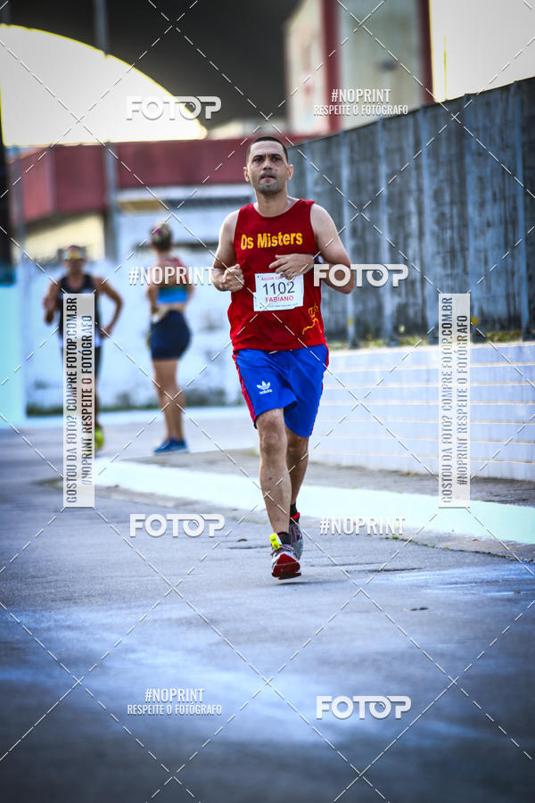 Buy your photos of the eventguia 13K Praia Grande on Fotop