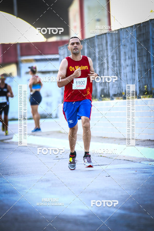 Buy your photos of the eventguia 13K Praia Grande on Fotop