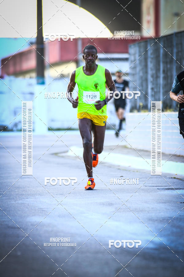 Buy your photos of the eventguia 13K Praia Grande on Fotop