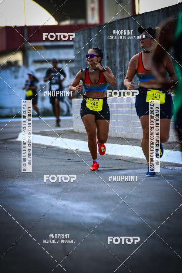 Buy your photos of the eventguia 13K Praia Grande on Fotop