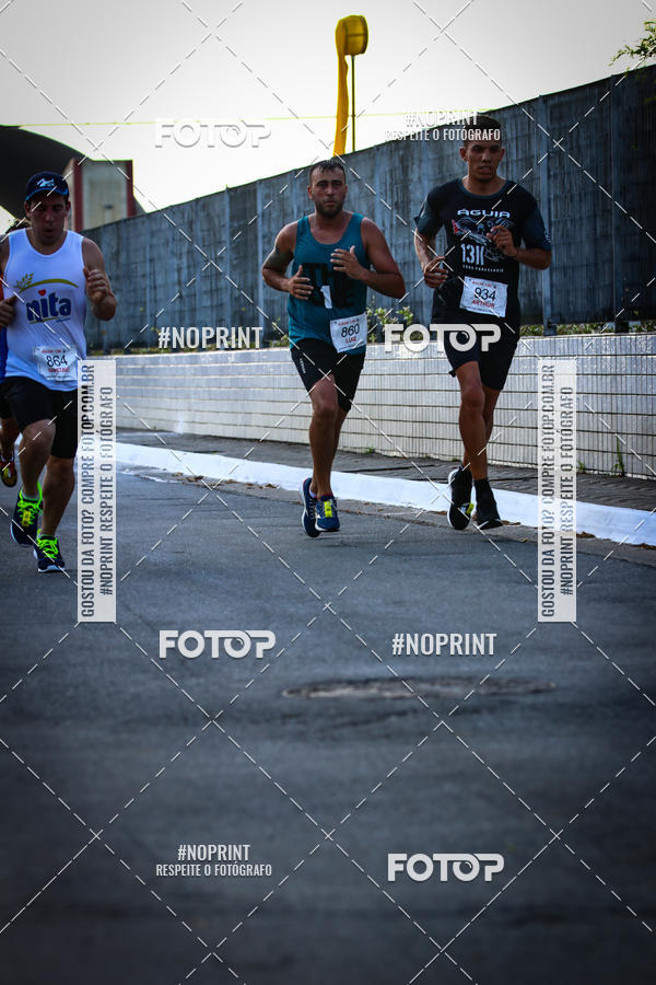 Buy your photos of the eventguia 13K Praia Grande on Fotop