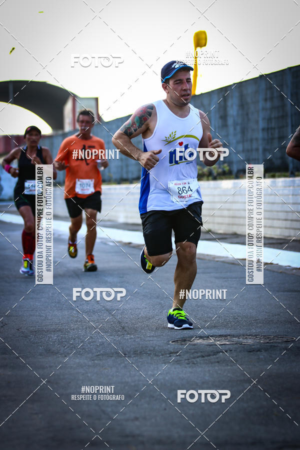 Buy your photos of the eventguia 13K Praia Grande on Fotop