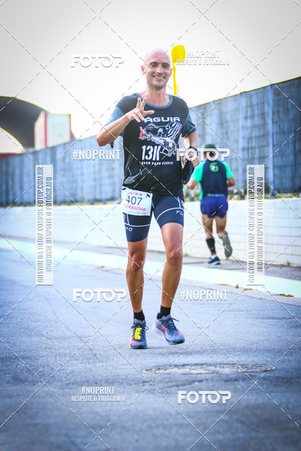 Buy your photos of the eventguia 13K Praia Grande on Fotop