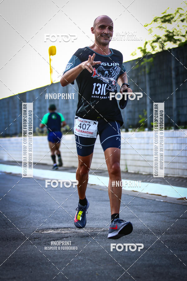 Buy your photos of the eventguia 13K Praia Grande on Fotop