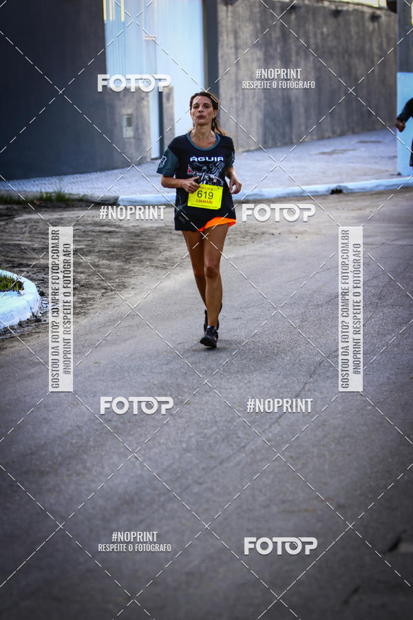 Buy your photos of the eventguia 13K Praia Grande on Fotop