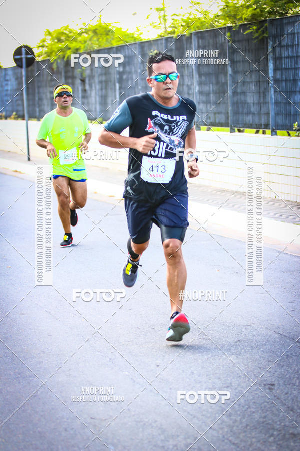 Buy your photos of the eventguia 13K Praia Grande on Fotop