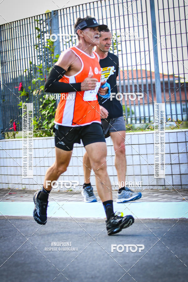 Buy your photos of the eventguia 13K Praia Grande on Fotop