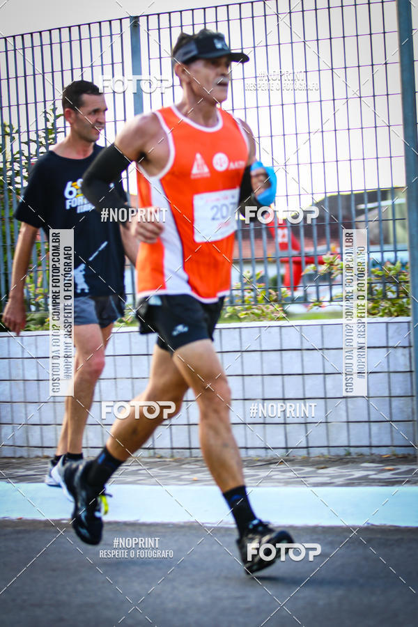 Buy your photos of the eventguia 13K Praia Grande on Fotop