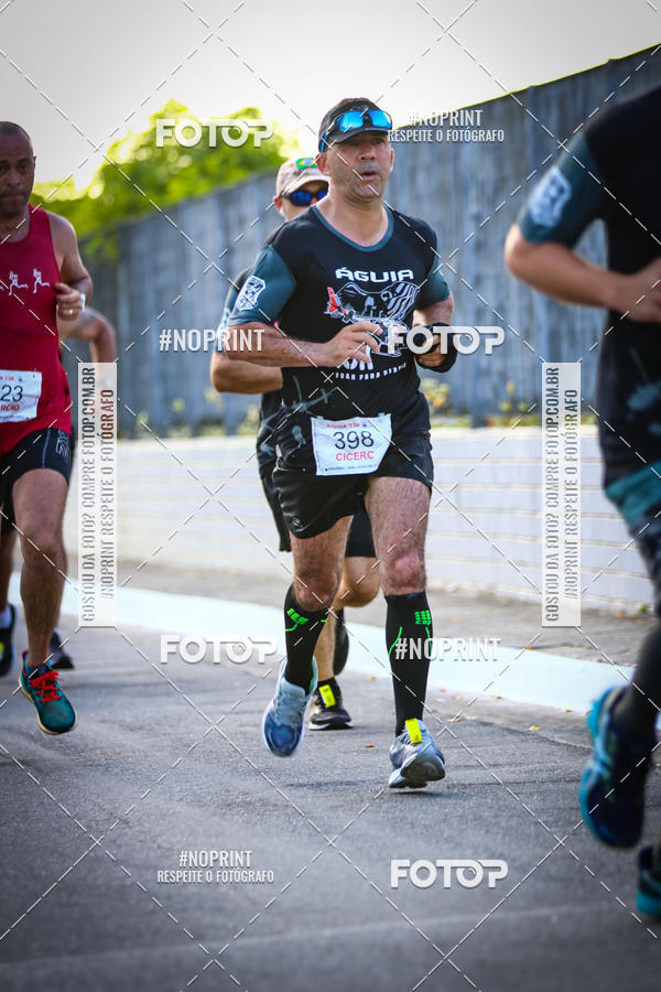 Buy your photos of the eventguia 13K Praia Grande on Fotop