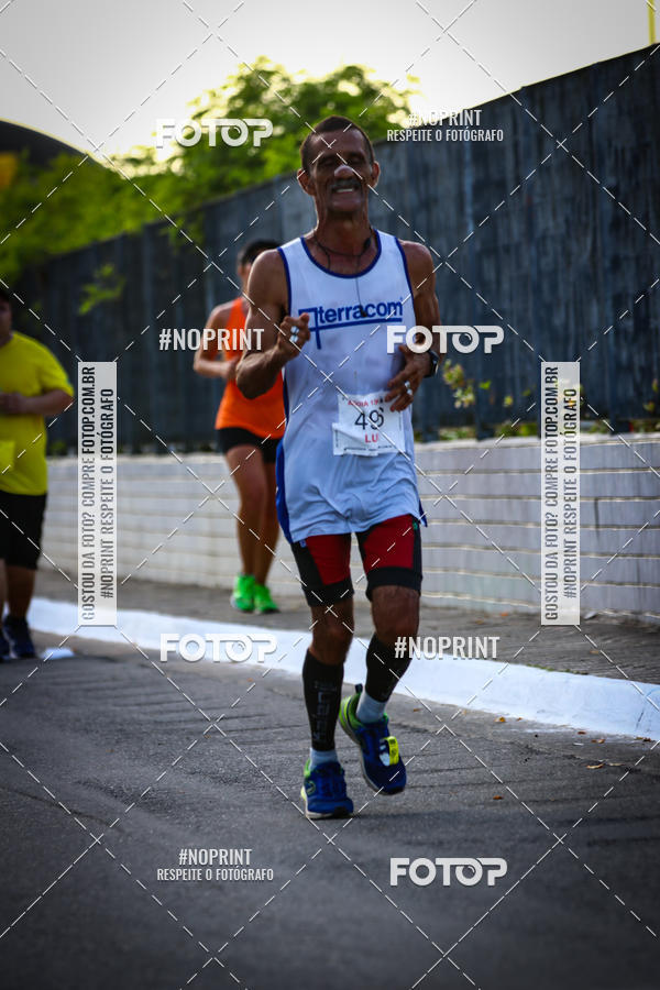 Buy your photos of the eventguia 13K Praia Grande on Fotop