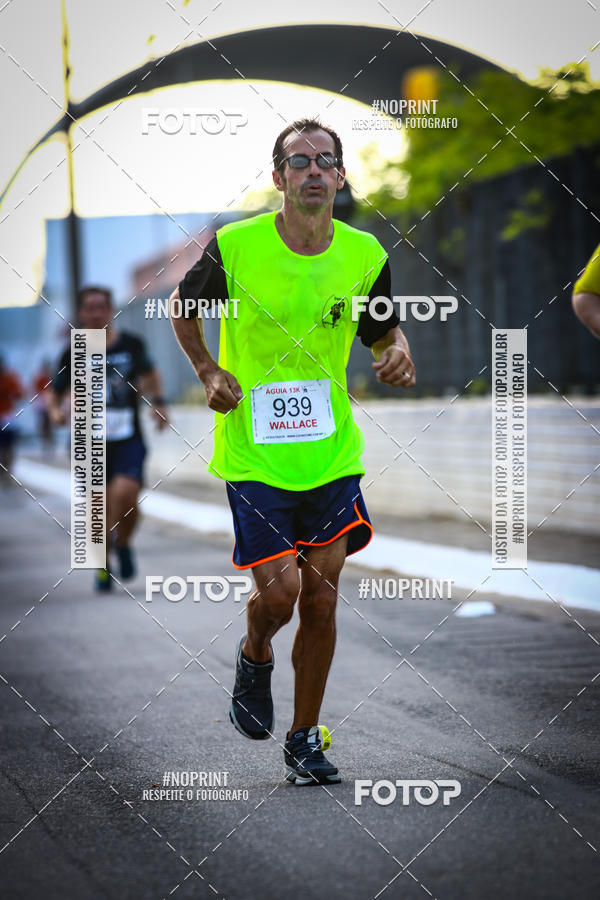 Buy your photos of the eventguia 13K Praia Grande on Fotop