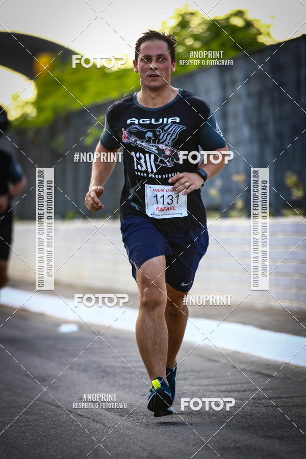 Buy your photos of the eventguia 13K Praia Grande on Fotop