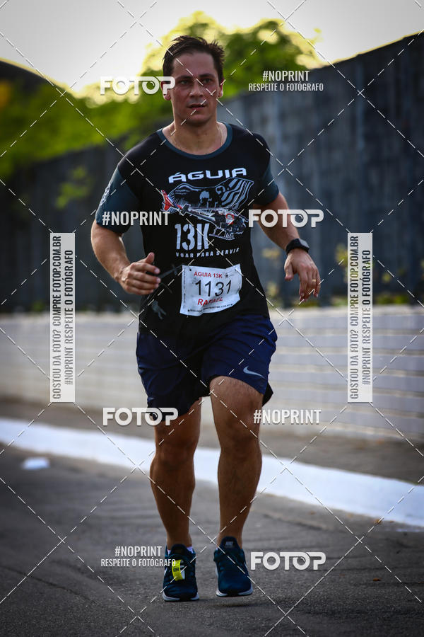 Buy your photos of the eventguia 13K Praia Grande on Fotop