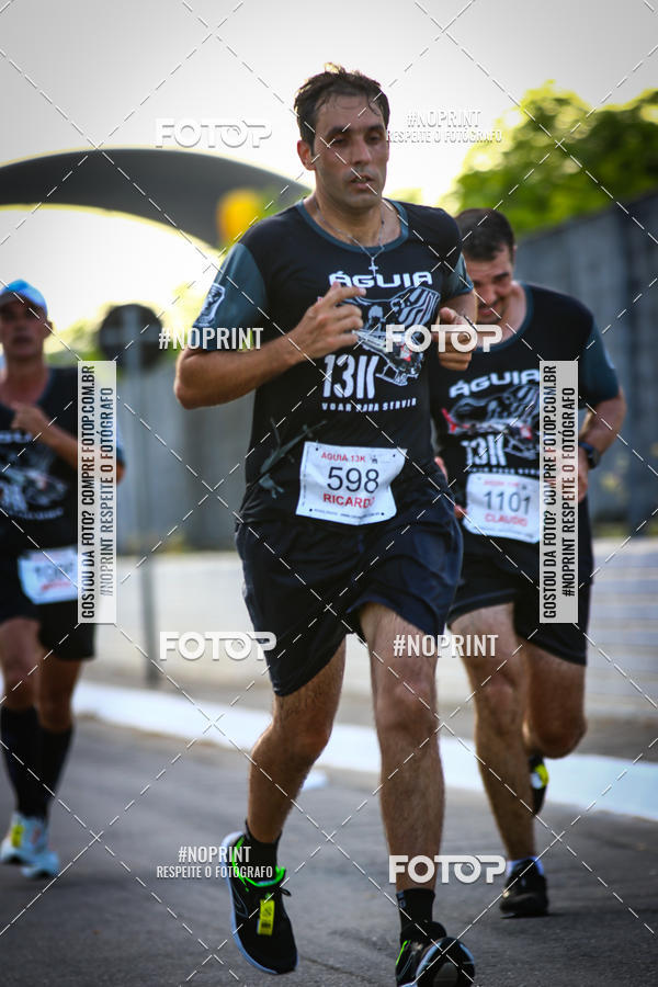 Buy your photos of the eventguia 13K Praia Grande on Fotop