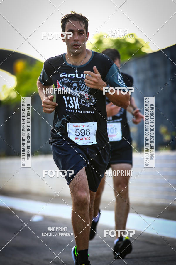 Buy your photos of the eventguia 13K Praia Grande on Fotop