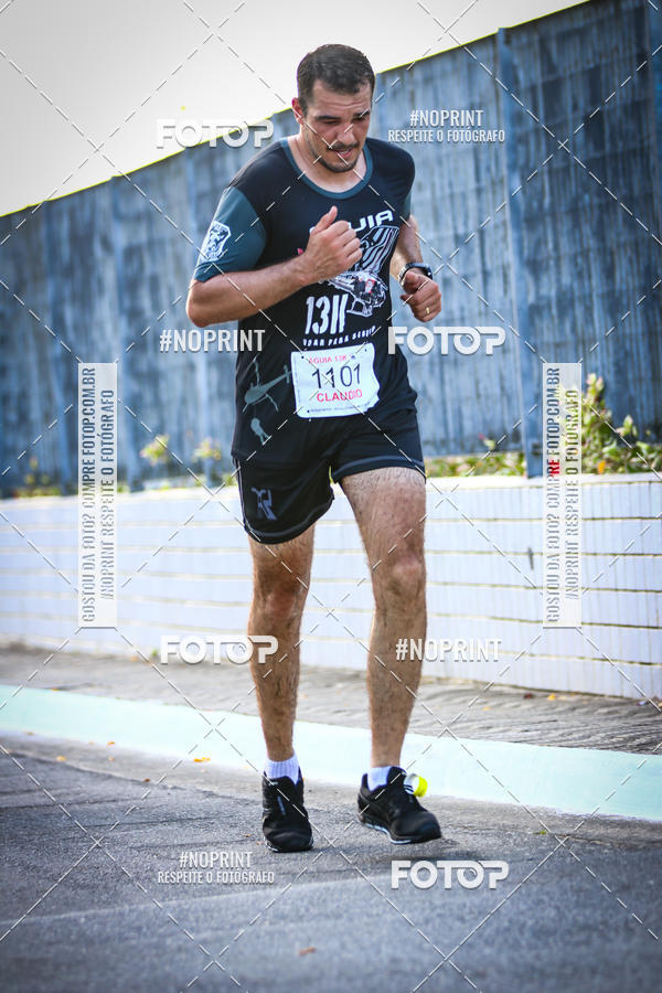 Buy your photos of the eventguia 13K Praia Grande on Fotop