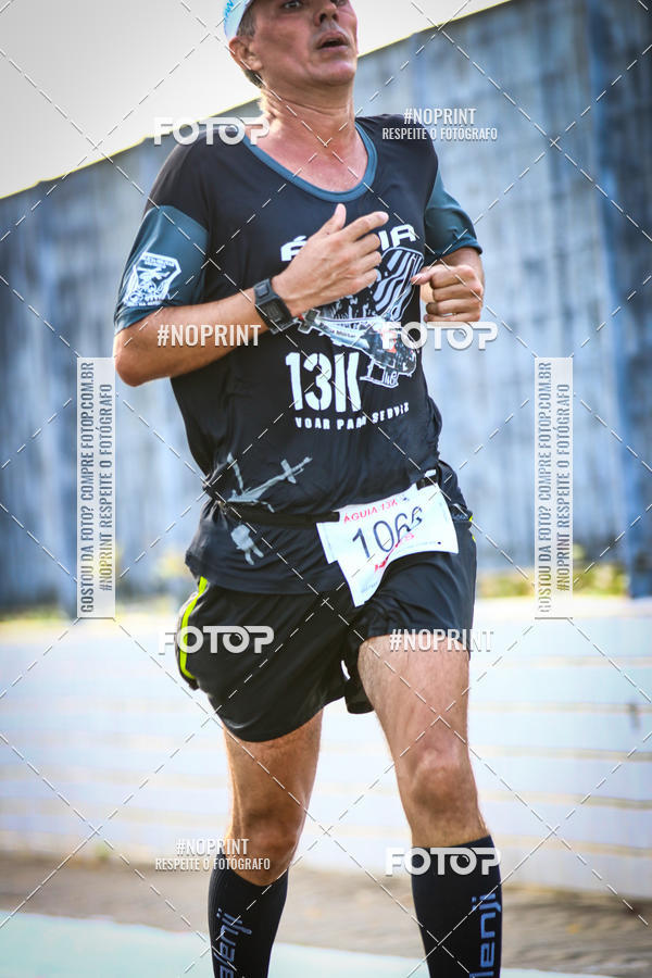 Buy your photos of the eventguia 13K Praia Grande on Fotop