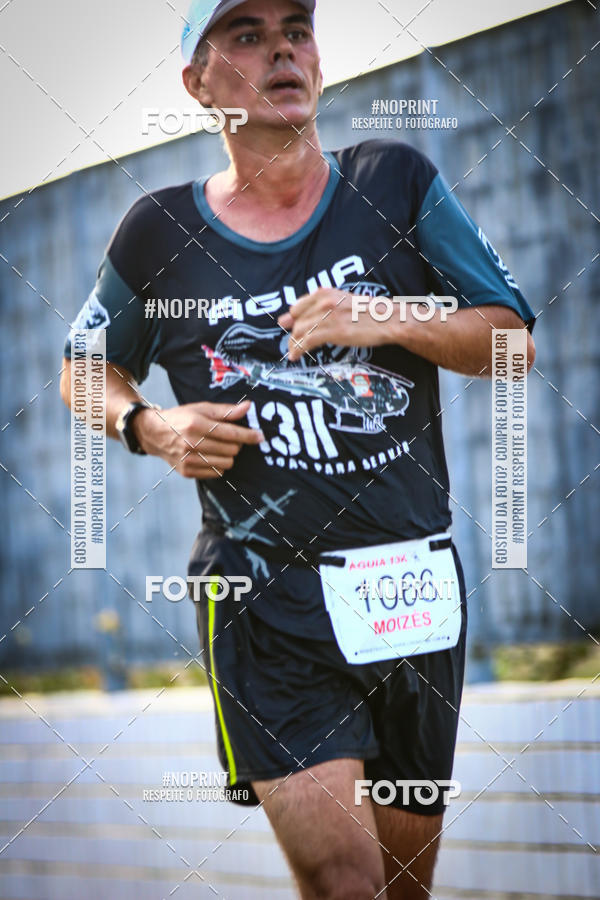 Buy your photos of the eventguia 13K Praia Grande on Fotop