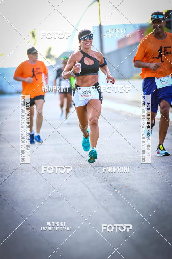 Buy your photos of the eventguia 13K Praia Grande on Fotop