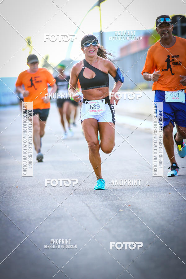 Buy your photos of the eventguia 13K Praia Grande on Fotop