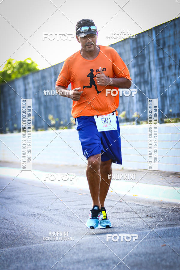 Buy your photos of the eventguia 13K Praia Grande on Fotop