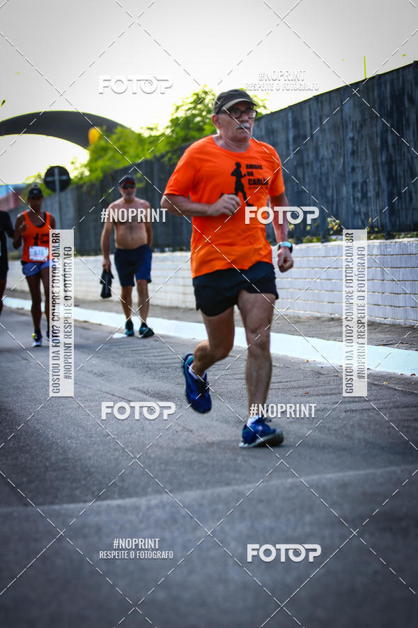 Buy your photos of the eventguia 13K Praia Grande on Fotop