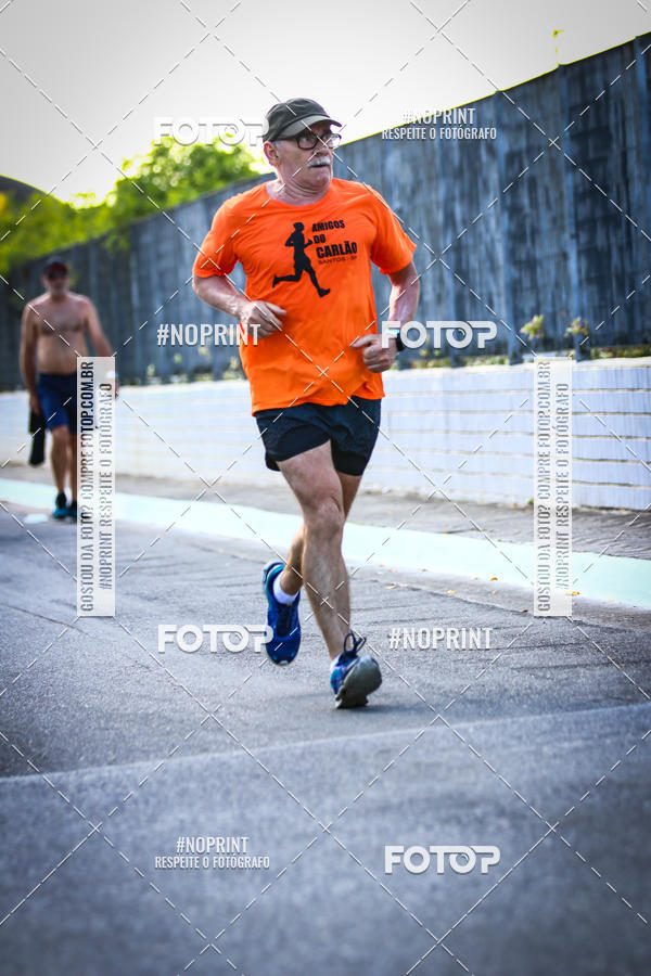 Buy your photos of the eventguia 13K Praia Grande on Fotop