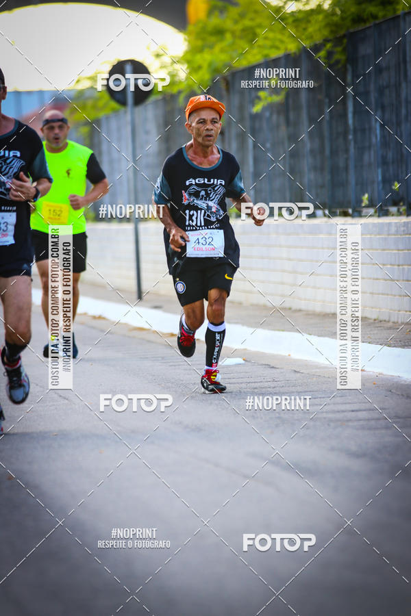 Buy your photos of the eventguia 13K Praia Grande on Fotop