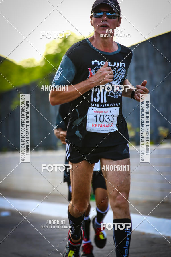 Buy your photos of the eventguia 13K Praia Grande on Fotop