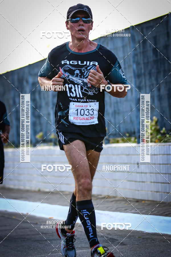 Buy your photos of the eventguia 13K Praia Grande on Fotop