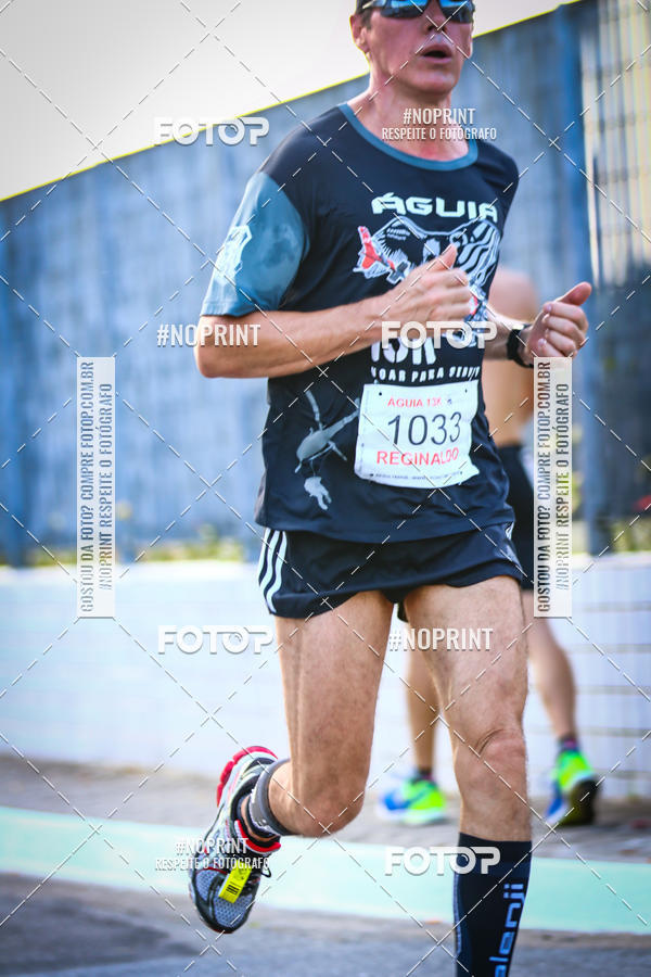 Buy your photos of the eventguia 13K Praia Grande on Fotop