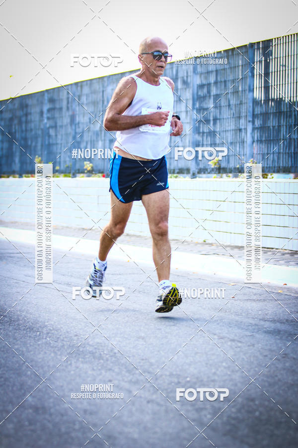 Buy your photos of the eventguia 13K Praia Grande on Fotop