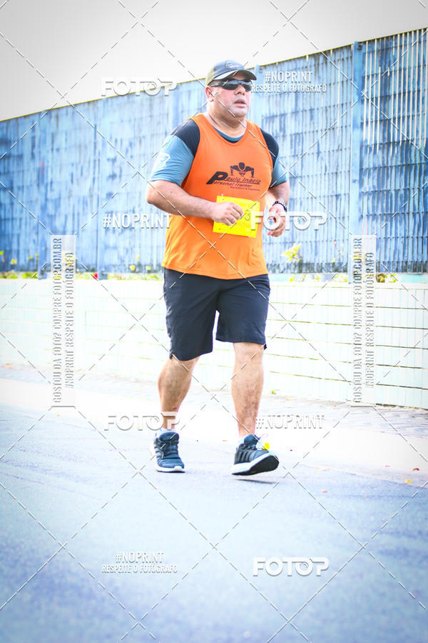 Buy your photos of the eventguia 13K Praia Grande on Fotop