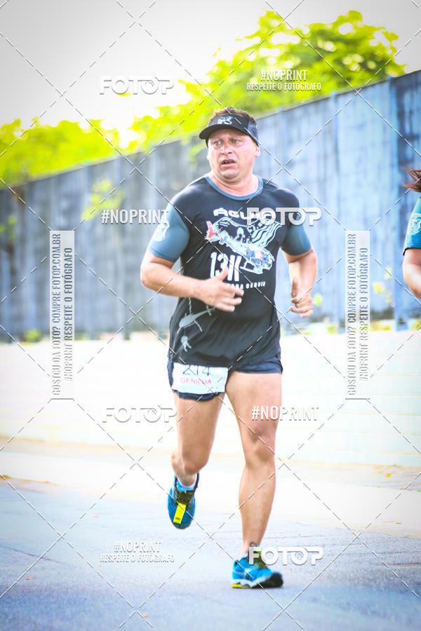 Buy your photos of the eventguia 13K Praia Grande on Fotop