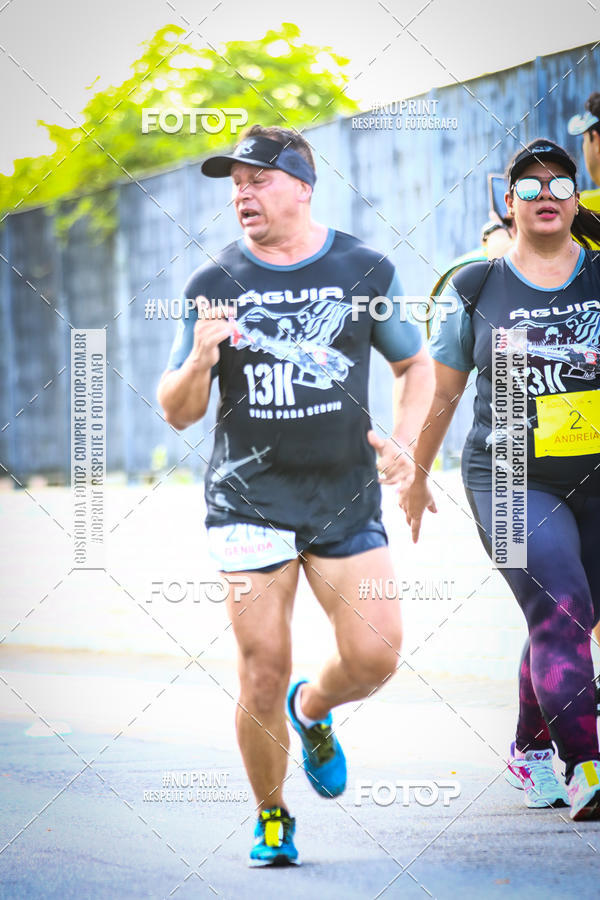 Buy your photos of the eventguia 13K Praia Grande on Fotop