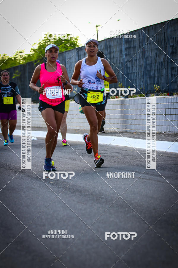 Buy your photos of the eventguia 13K Praia Grande on Fotop