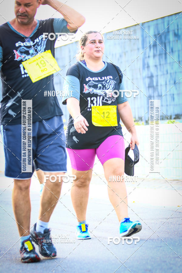 Buy your photos of the eventguia 13K Praia Grande on Fotop