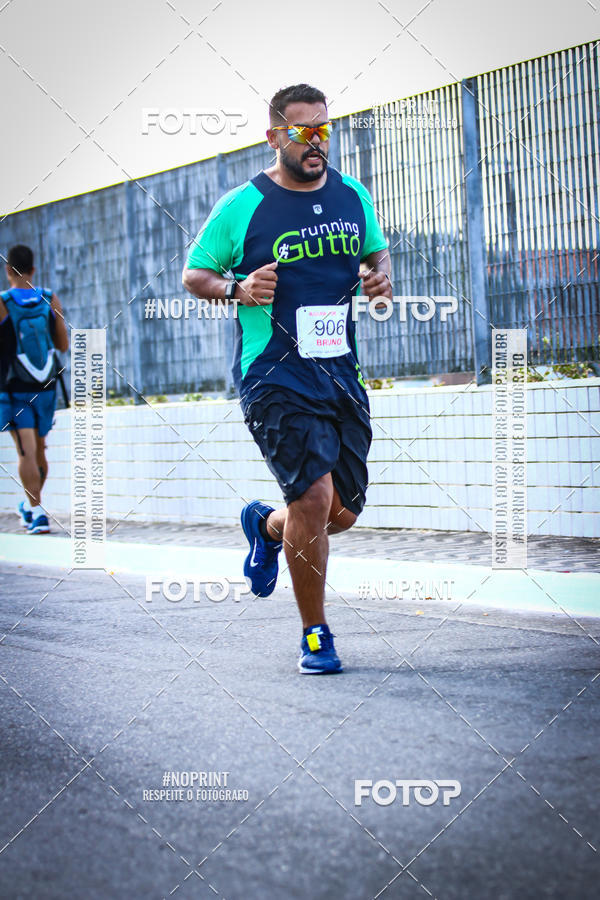 Buy your photos of the eventguia 13K Praia Grande on Fotop