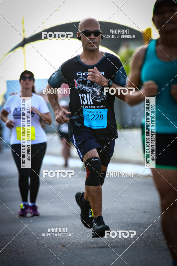 Buy your photos of the eventguia 13K Praia Grande on Fotop