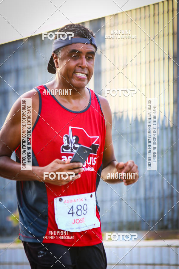 Buy your photos of the eventguia 13K Praia Grande on Fotop