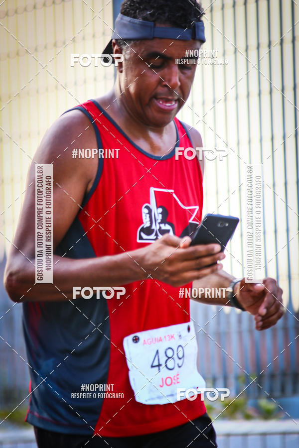 Buy your photos of the eventguia 13K Praia Grande on Fotop