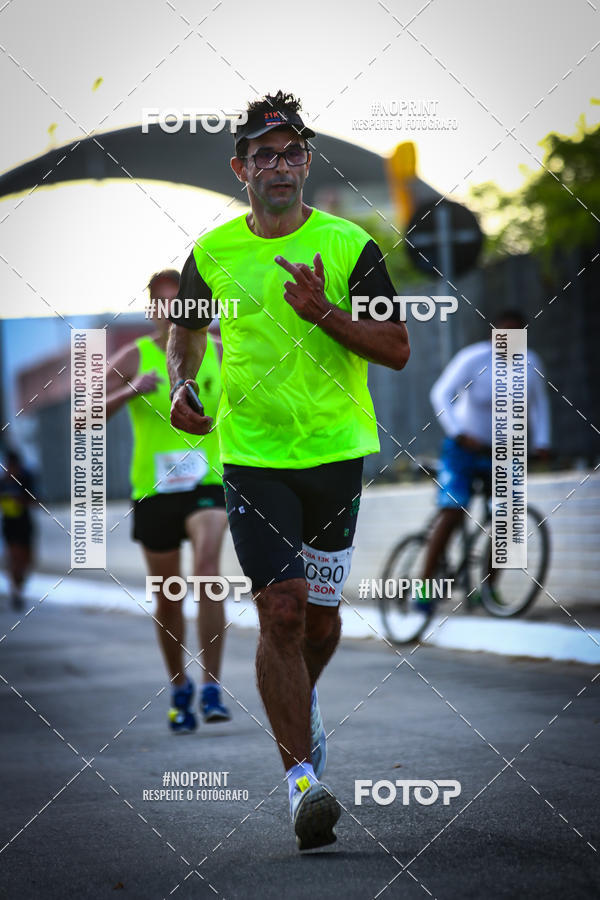 Buy your photos of the eventguia 13K Praia Grande on Fotop